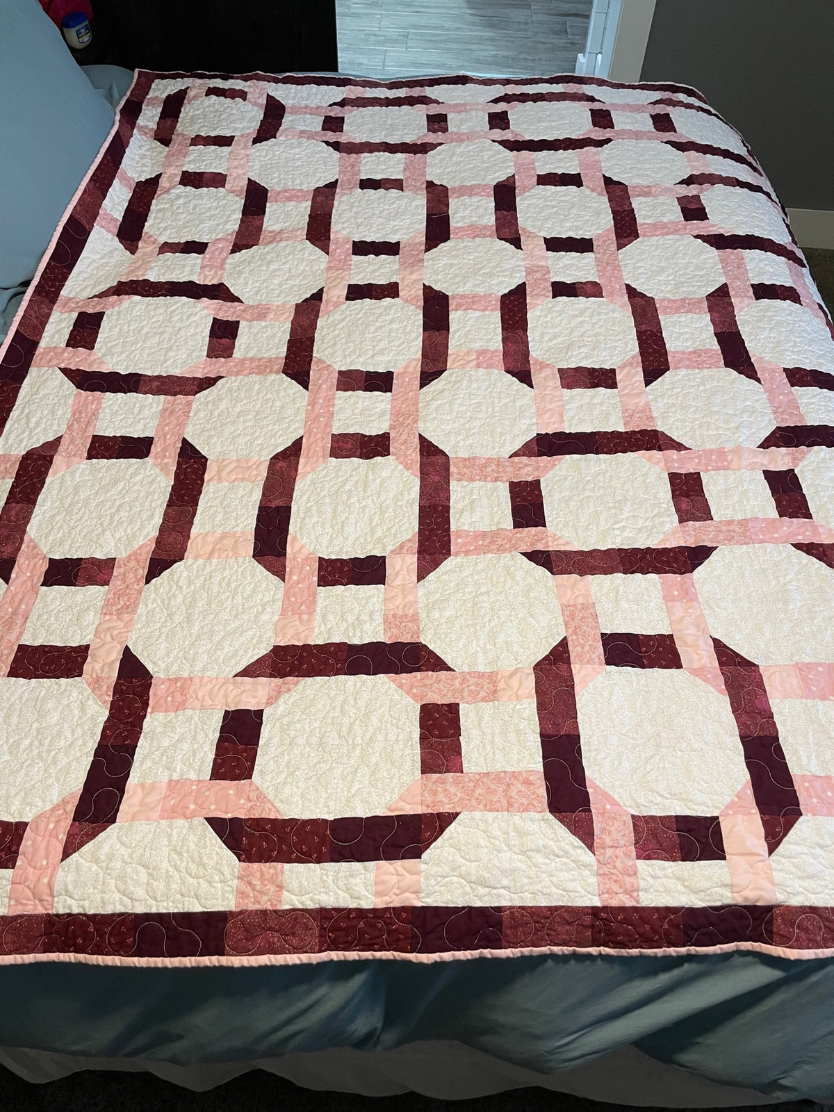 Blush and burgundy lattice quilt