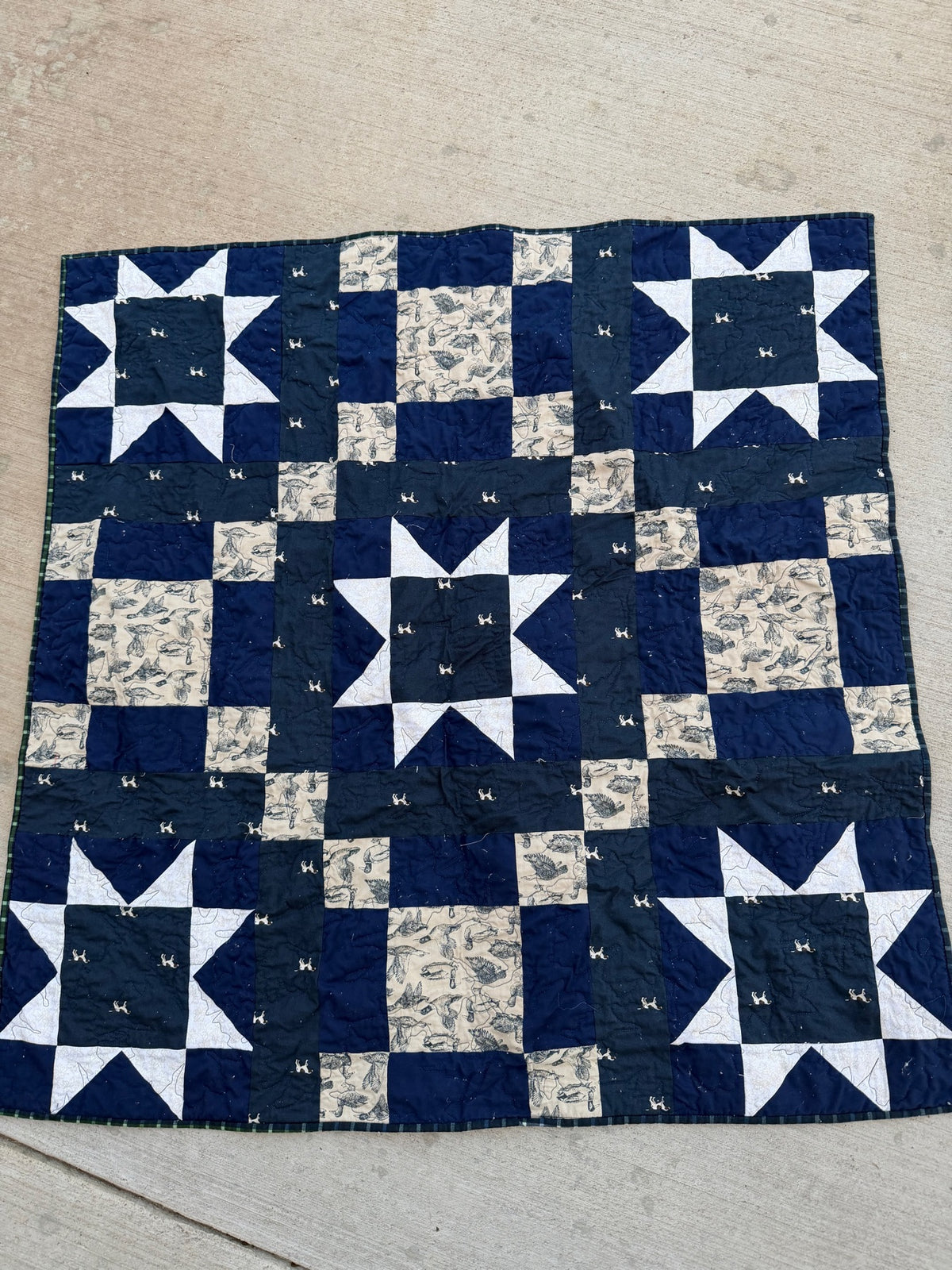 Navy and white star quilt