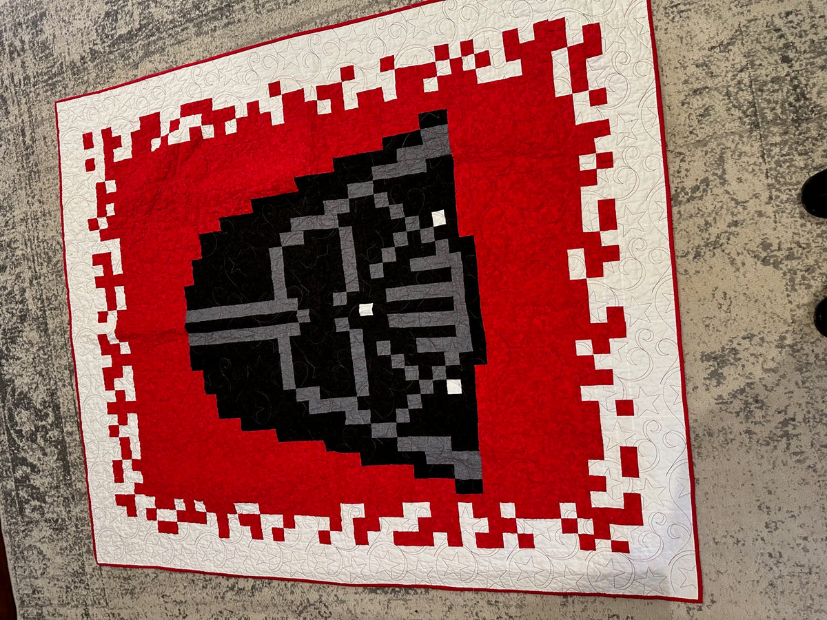 Red black and white space themed quilt
