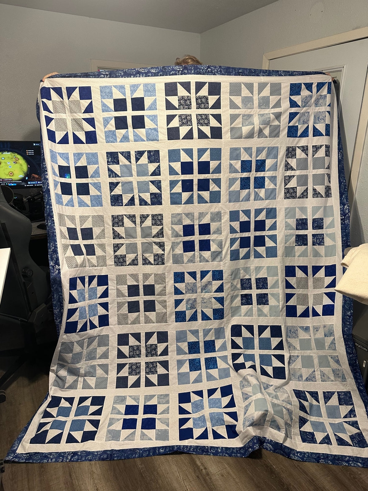 Large navy and white star quilt