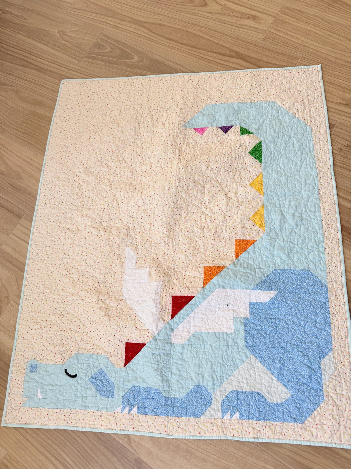 Pastel dragon baby quilt