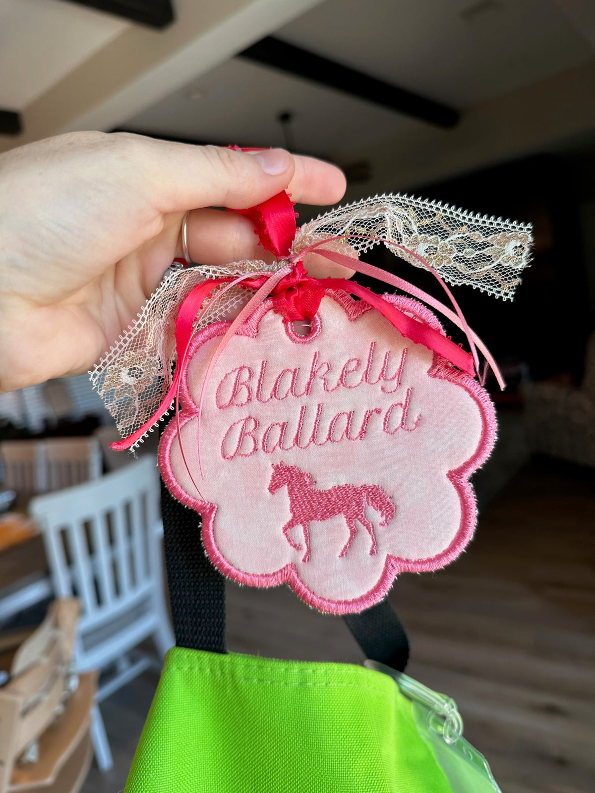 Pink embroidered scalloped name tag