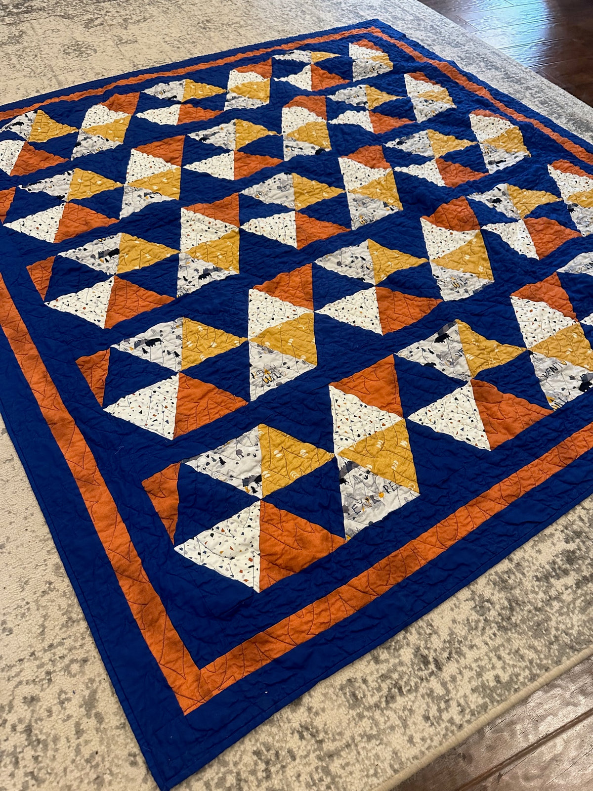 Orange and blue triangle quilt